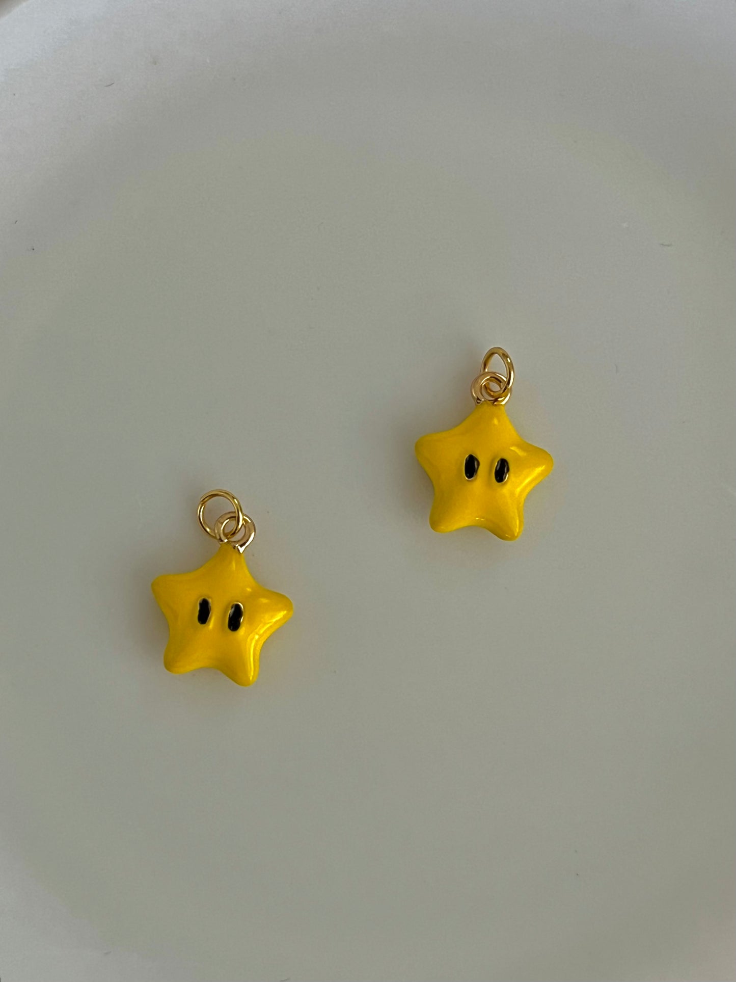 Yellow star charm